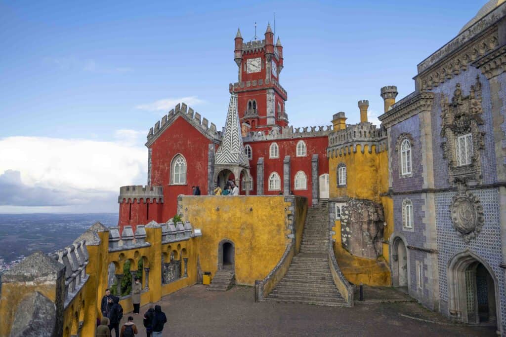 red, yellow, and blue parts of Pena Palace in Sintra 