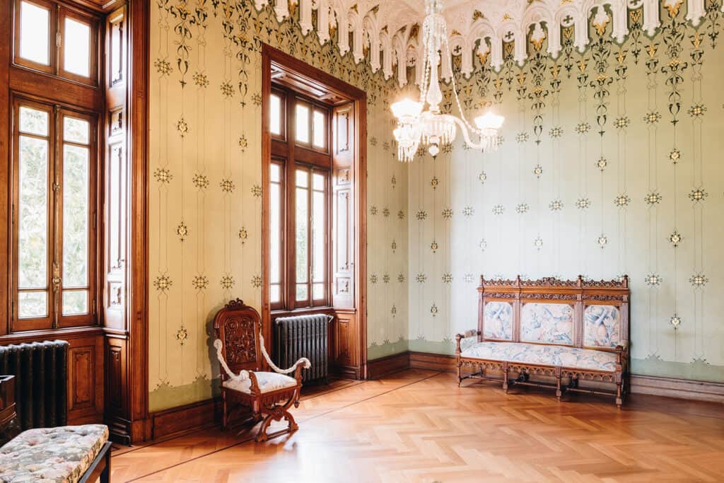 an ornate, 19th century room decorated in neoclassical style, inside Biester Palace