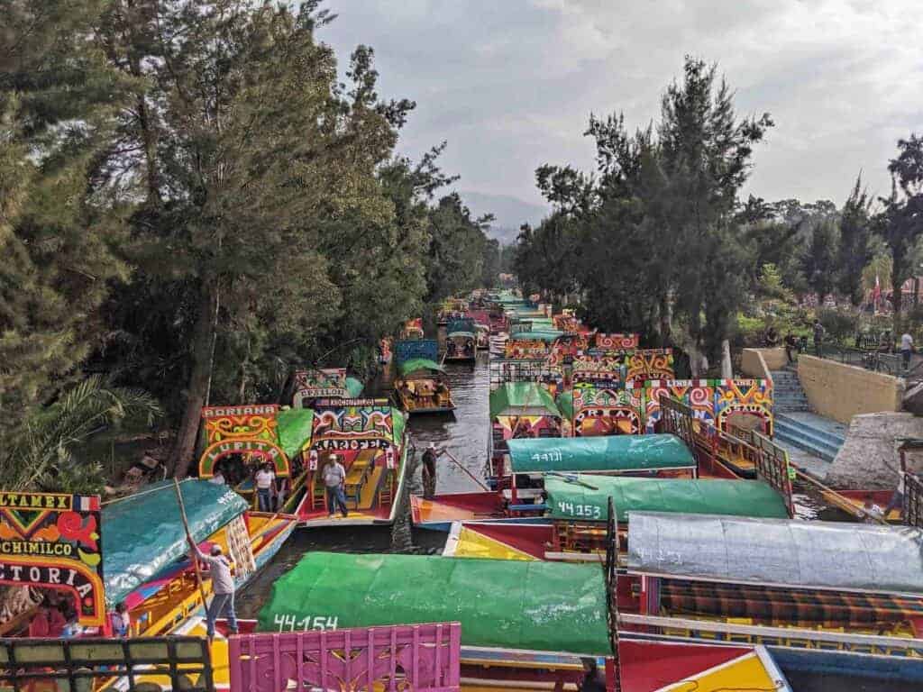 The Xochimilco Canals busy with tons of trajineras floating through the gardens