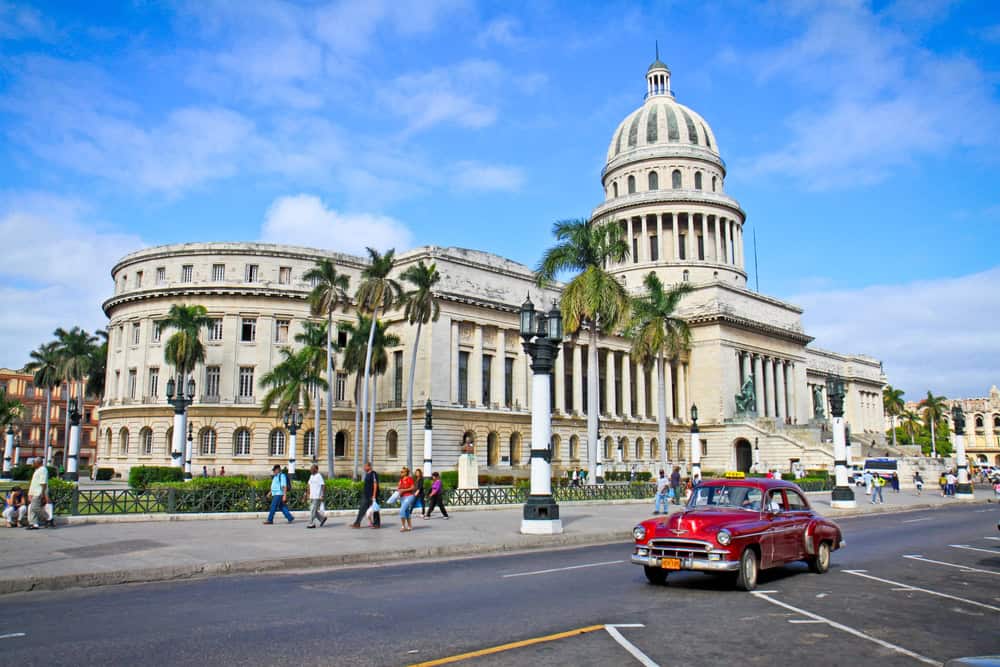 A classic car in front of the Capitol in Havana.