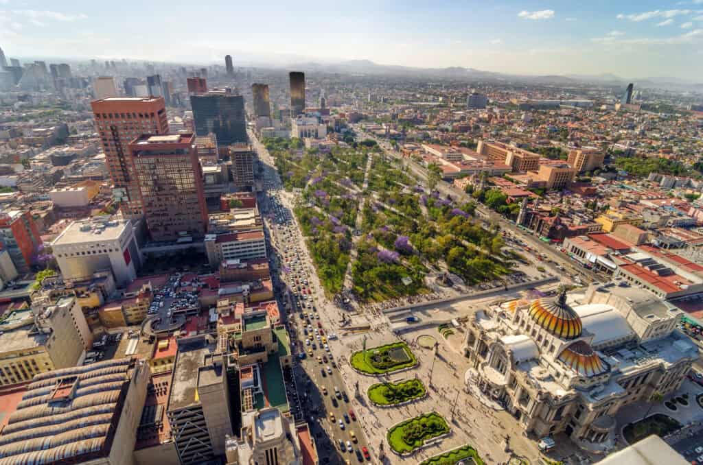 an aerial view of the busy streets and parks of mexico city