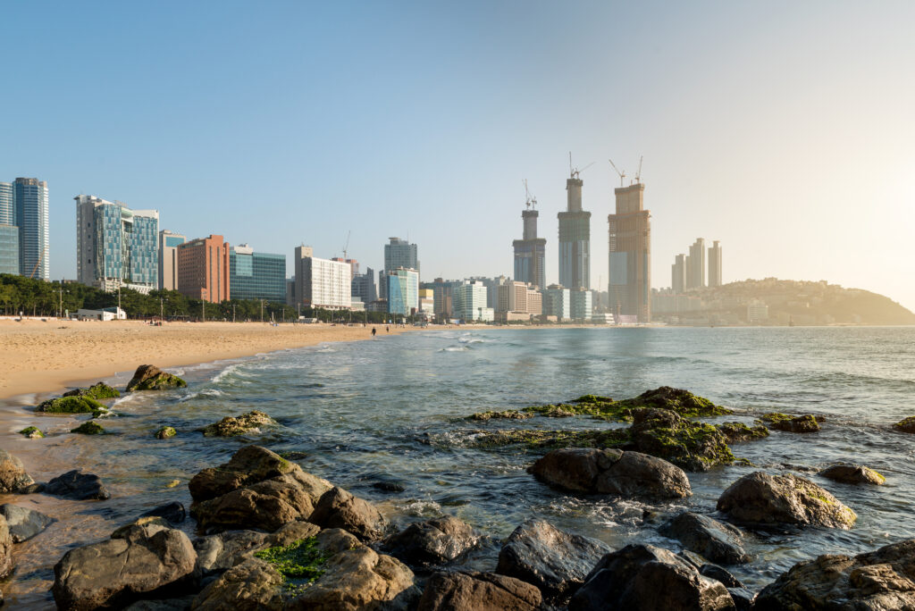 View of Haeundae beach with Busan's cityscape in the distance