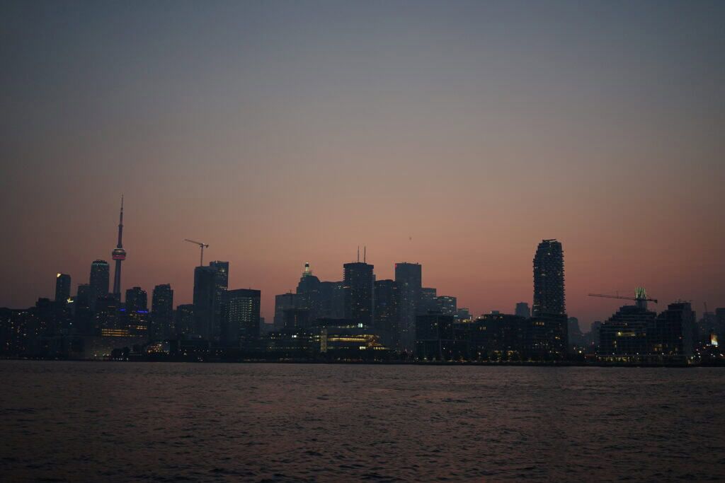 A view of the Toronto skyline from the Toronto Islands, at sunset time.
