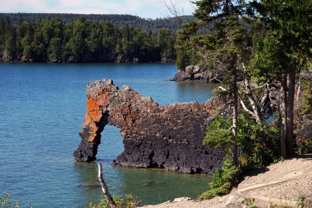 Sea Lion rock formation along the Lake Superior shoreline in Sleeping Giant Provincial Park, surrounded by forest.
