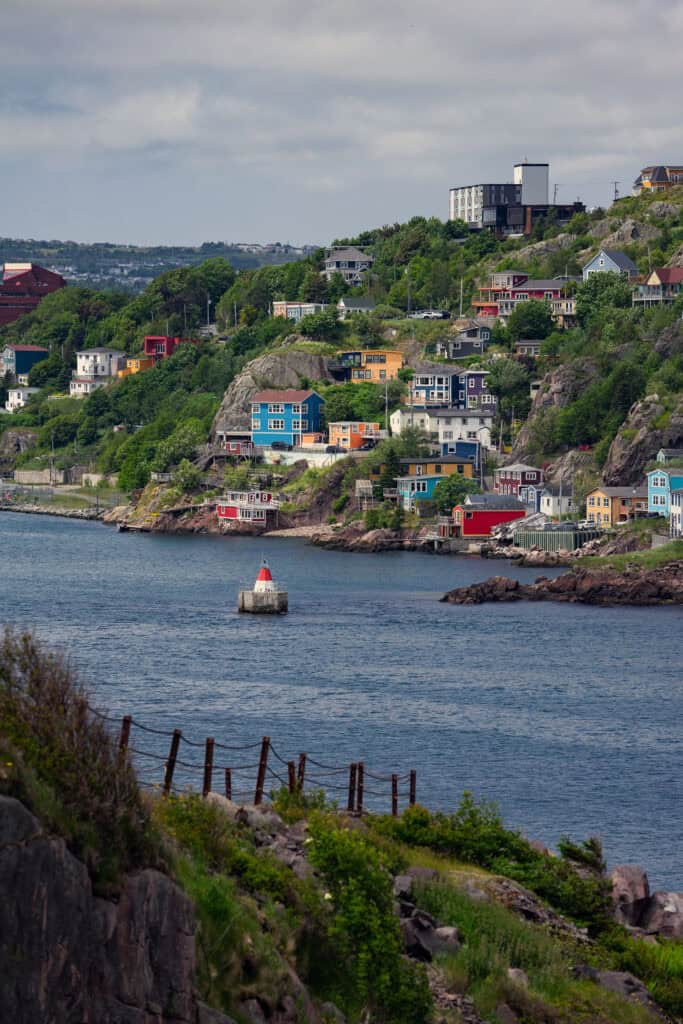 Colourful houses of The Battery built along the rocky slopes beside St. John’s Harbour in Newfoundland and Labrador.