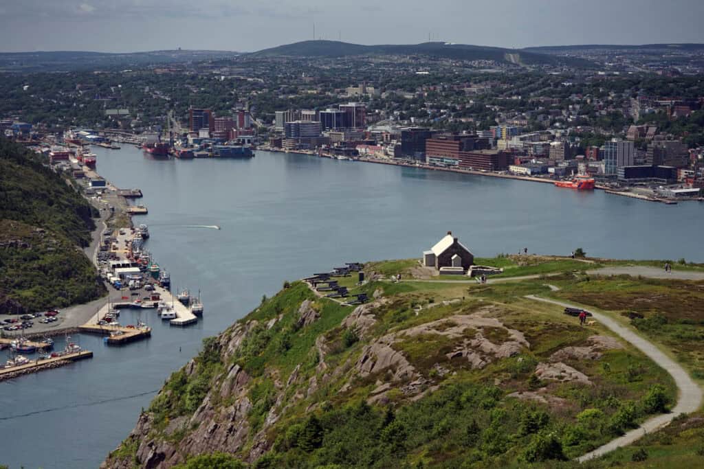 View from Signal Hill overlooking St. John’s Harbour, the downtown waterfront and historic military structures on the hillside.